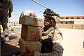 US Navy 080723-M-6065T-003 Hospital Corpsman 2nd Class Doug A. Augustine, a corpsman with Delta Co., 4th Light Armored Reconnaissance Battalion, delivers medical supplies.jpg