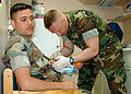 US Navy 020418-N-7463C-001 A Hospital Corpsman draws blood from a Patient.jpg